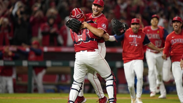 May 10, 2022; Anaheim, California, USA; Los Angeles Angels starting pitcher Reid Detmers (48) celebrates with catcher Chad Wallach (35) after throwing a no hitter against the Tampa Bay Rays at Angel Stadium. Mandatory Credit: Kirby Lee-USA TODAY Sports