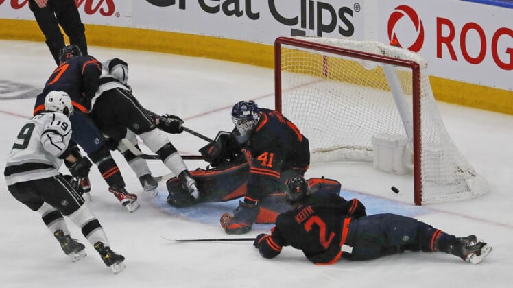 May 10, 2022; Edmonton, Alberta, CAN; Los Angeles Kings forward Adrian Kempe (9) scores the over-time winning gaol against Edmonton Oilers goaltender Mike Smith (41) in game five of the first round of the 2022 Stanley Cup Playoffs at Rogers Place. Mandatory Credit: Perry Nelson-USA TODAY Sports