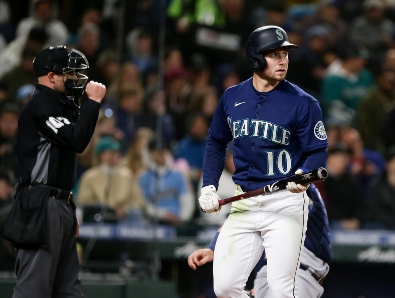 May 7, 2022; Seattle, Washington, USA;  Seattle Mariners right fielder Jarred Kelenic (10) reacts after striking out swinging during the seventh inning against the Tampa Bay Rays at T-Mobile Park. Mandatory Credit: Lindsey Wasson-USA TODAY Sports