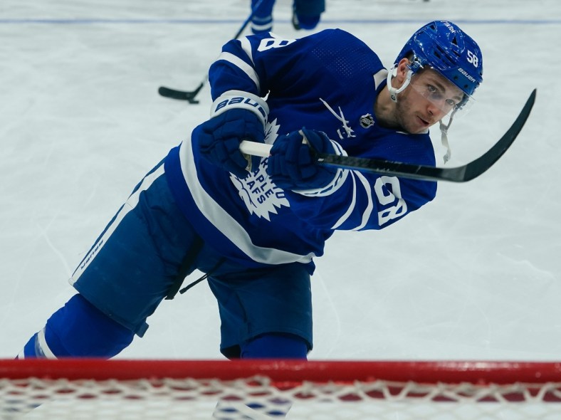 May 4, 2022; Toronto, Ontario, CAN; Toronto Maple Leafs forward Michael Bunting (58) shoots the puck during warm up before game two of the first round of the 2022 Stanley Cup Playoffs against the Tampa Bay Lightning at Scotiabank Arena. Mandatory Credit: John E. Sokolowski-USA TODAY Sports