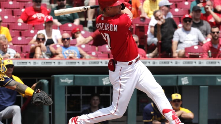 May 11, 2022; Cincinnati, Ohio, USA; Cincinnati Reds designated hitter Tyler Stephenson (37) hits a three-run double against the Milwaukee Brewers during the second inning at Great American Ball Park. Mandatory Credit: David Kohl-USA TODAY Sports