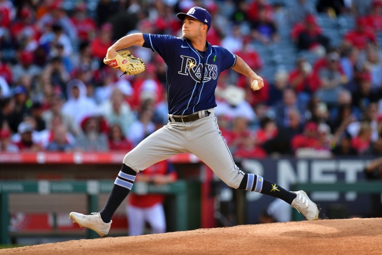 May 11, 2022; Anaheim, California, USA; Tampa Bay Rays starting pitcher Shane McClanahan (18) throws against the Los Angeles Angels during the third inning at Angel Stadium. Mandatory Credit: Gary A. Vasquez-USA TODAY Sports