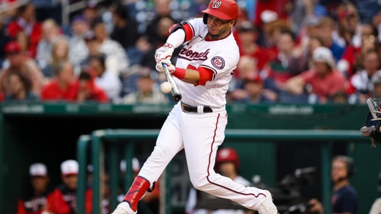 May 11, 2022; Washington, District of Columbia, USA; Washington Nationals left fielder Yadiel Hernandez (29) doubles against the New York Mets during the first inning at Nationals Park. Mandatory Credit: Scott Taetsch-USA TODAY Sports