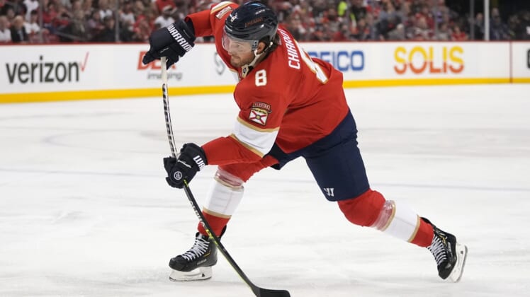 May 11, 2022; Sunrise, Florida, USA; Florida Panthers defenseman Ben Chiarot (8) shoots the puck during the second period of game five of the first round of the 2022 Stanley Cup Playoffs against the Washington Capitals at FLA Live Arena. Mandatory Credit: Jasen Vinlove-USA TODAY Sports