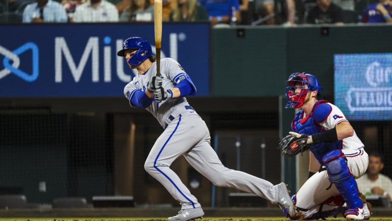 May 11, 2022; Arlington, Texas, USA;  Kansas City Royals third baseman Bobby Witt Jr. (7) hits a two run double during the fifth inning against the Texas Rangers at Globe Life Field. Mandatory Credit: Kevin Jairaj-USA TODAY Sports