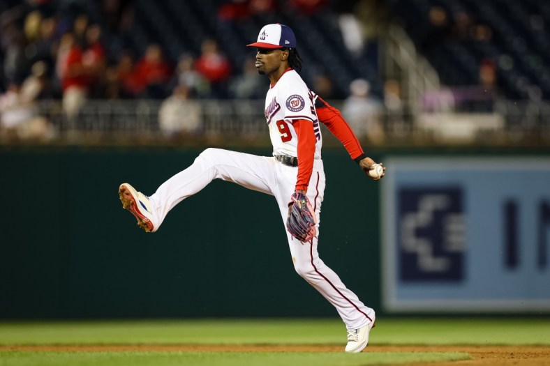 May 11, 2022; Washington, District of Columbia, USA; Washington Nationals shortstop Dee Strange-Gordon (9) celebrates after making the final out of the game against the New York Mets at Nationals Park. Mandatory Credit: Scott Taetsch-USA TODAY Sports