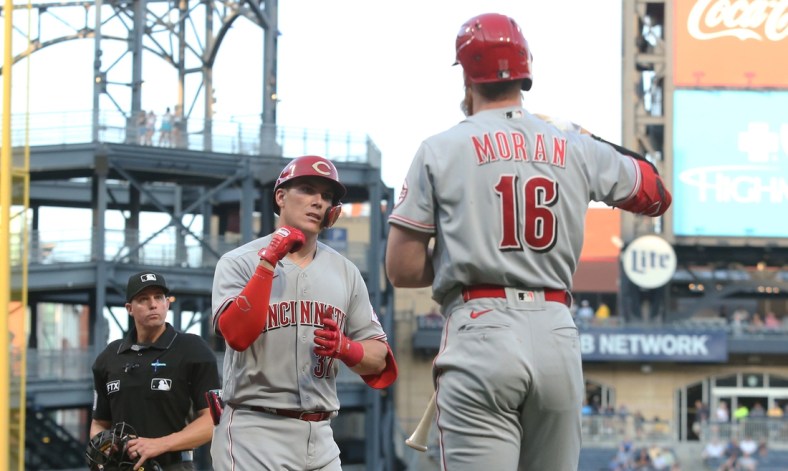 May 12, 2022; Pittsburgh, Pennsylvania, USA; Cincinnati Reds catcher Tyler Stephenson (37) celebrates his solo home run with first baseman Colin Moran (16) during the fourth inning against the Pittsburgh Pirates at PNC Park. Mandatory Credit: Charles LeClaire-USA TODAY Sports