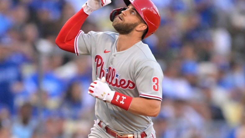 May 12, 2022; Los Angeles, California, USA; Philadelphia Phillies right fielder Bryce Harper (3) rounds third base after hitting a solo home run in the first inning against the Los Angeles Dodgers at Dodger Stadium. Mandatory Credit: Jayne Kamin-Oncea-USA TODAY Sports