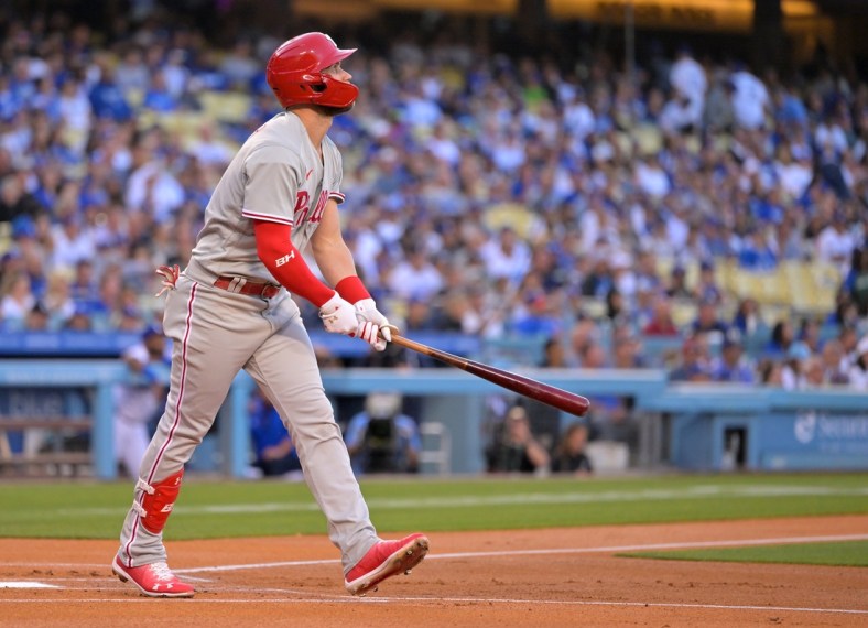 May 12, 2022; Los Angeles, California, USA; Philadelphia Phillies right fielder Bryce Harper (3) watches the flight of the ball on a solo home run in the first inning against the Los Angeles Dodgers at Dodger Stadium. Mandatory Credit: Jayne Kamin-Oncea-USA TODAY Sports