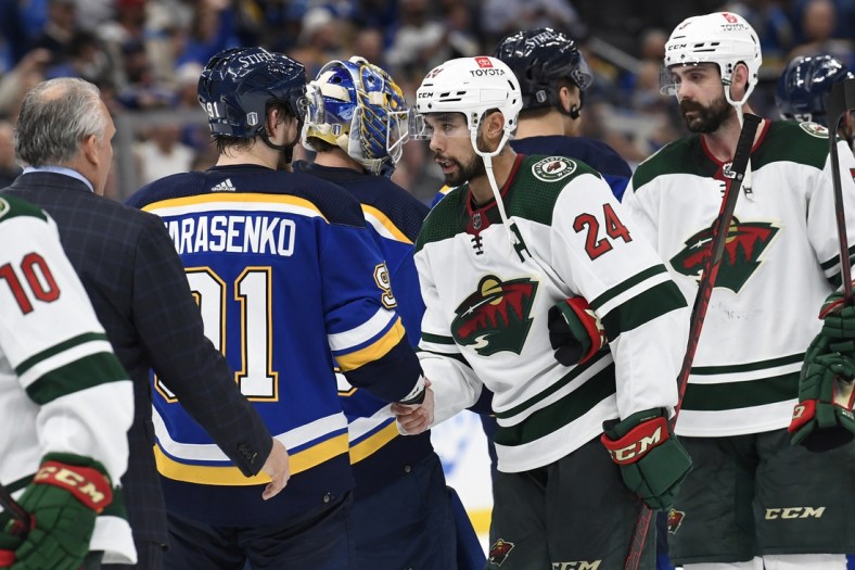 May 12, 2022; St. Louis, Missouri, USA; Minnesota Wild defenseman Matt Dumba (24) and St. Louis Blues right wing Vladimir Tarasenko (91) shake hands after game six of the first round of the 2022 Stanley Cup Playoffs at Enterprise Center. Mandatory Credit: Jeff Le-USA TODAY Sports