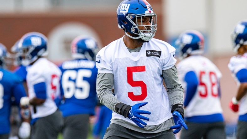 May 13, 2022; East Rutherford, NJ, USA; New York Giants linebacker Kayvon Thibodeaux (5) practices a drill during rookie camp at Quest Diagnostics Training Center. Mandatory Credit: John Jones-USA TODAY Sports