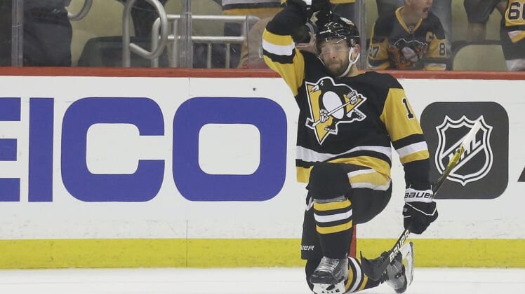 May 13, 2022; Pittsburgh, Pennsylvania, USA; Pittsburgh Penguins right wing Bryan Rust (17) reacts after scoring a goal against ithe New York Rangers during the first period n game six of the first round of the 2022 Stanley Cup Playoffs at PPG Paints Arena. Mandatory Credit: Charles LeClaire-USA TODAY Sports