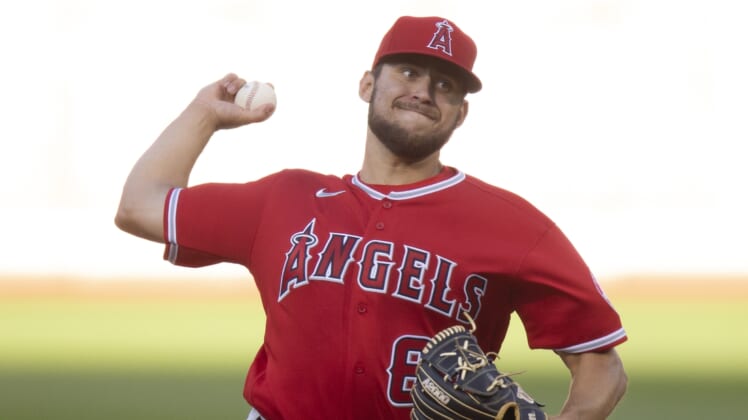 May 13, 2022; Oakland, California, USA; Los Angeles Angels starting pitcher Chase Silseth (63) delivers a pitch against the Oakland Athletics during the second inning at RingCentral Coliseum. Mandatory Credit: D. Ross Cameron-USA TODAY Sports
