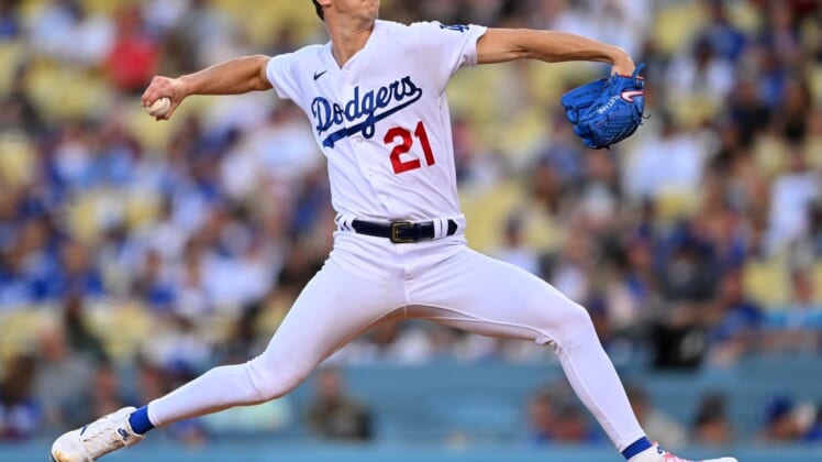 May 13, 2022; Los Angeles, California, USA;  Los Angeles Dodgers starting pitcher Walker Buehler (21) pitches in the second inning against the Philadelphia Phillies at Dodger Stadium. Mandatory Credit: Jayne Kamin-Oncea-USA TODAY Sports