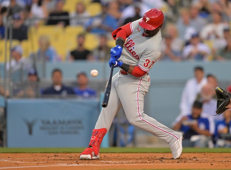 May 13, 2022; Los Angeles, California, USA;  Philadelphia Phillies center fielder Odubel Herrera (37) singles in the first inning of the game against the Los Angeles Dodgers at Dodger Stadium. Mandatory Credit: Jayne Kamin-Oncea-USA TODAY Sports