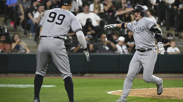 May 13, 2022; Chicago, Illinois, USA;  New York Yankees third baseman Josh Donaldson (28) celebrates with New York Yankees right fielder Aaron Judge (99) after they score on Donaldson's  two run home run against the Chicago White Sox during the ninth inning at Guaranteed Rate Field. Mandatory Credit: Matt Marton-USA TODAY Sports