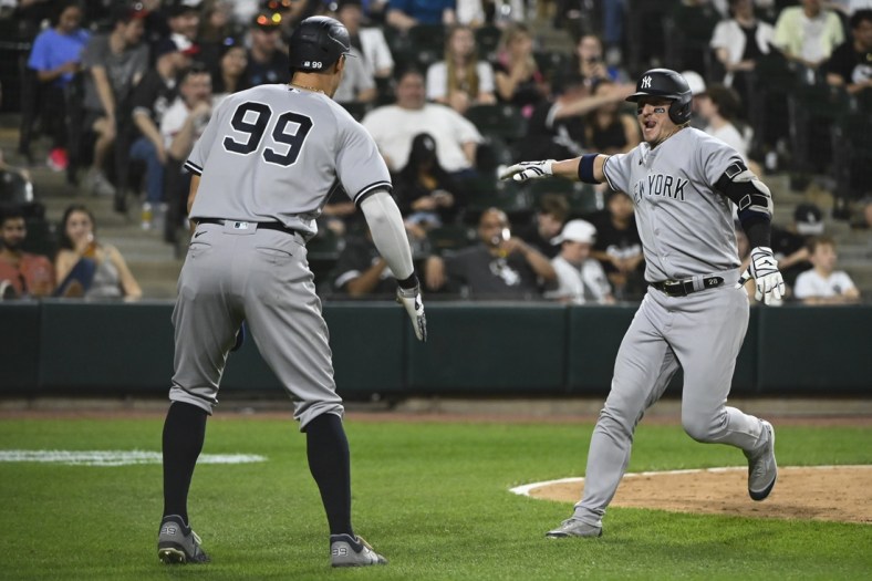 May 13, 2022; Chicago, Illinois, USA;  New York Yankees third baseman Josh Donaldson (28) celebrates with New York Yankees right fielder Aaron Judge (99) after they score on Donaldson's  two run home run against the Chicago White Sox during the ninth inning at Guaranteed Rate Field. Mandatory Credit: Matt Marton-USA TODAY Sports