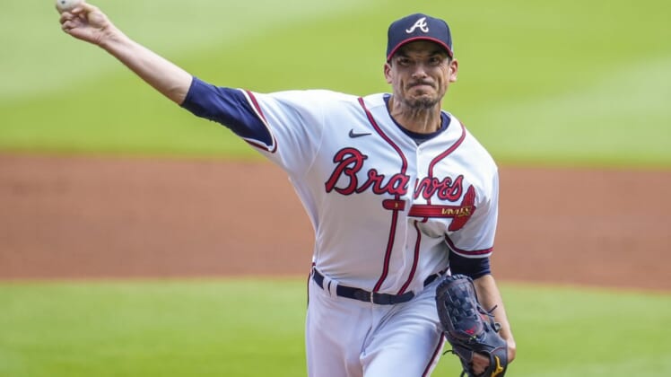 May 14, 2022; Cumberland, Georgia, USA; Atlanta Braves starting pitcher Charlie Morton (50) pitches against the San Diego Padres during the first inning at Truist Park. Mandatory Credit: Dale Zanine-USA TODAY Sports