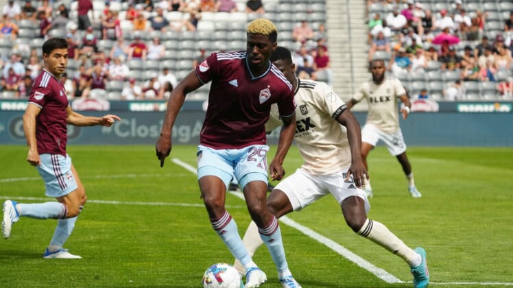 May 14, 2022; Commerce City, Colorado, USA; Los Angeles FC defender Mamadou Fall (5) and Colorado Rapids forward Gyasi Zardes (29) during the second half against Los Angeles FC at Dick's Sporting Goods Park. Mandatory Credit: Ron Chenoy-USA TODAY Sports