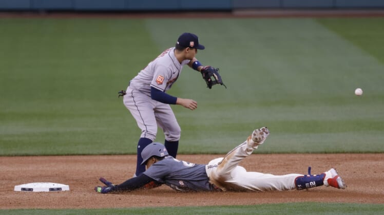 May 14, 2022; Washington, District of Columbia, USA; Washington Nationals left fielder Juan Soto (22) slides into second base with a double ahead of a tag by Houston Astros second baseman Aledmys Diaz (16) during the first inning at Nationals Park. Mandatory Credit: Geoff Burke-USA TODAY Sports