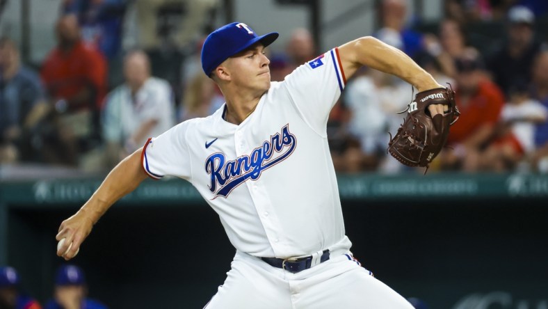 May 14, 2022; Arlington, Texas, USA; Texas Rangers starting pitcher Glenn Otto (49) throws during the first inning against the Boston Red Sox at Globe Life Field. Mandatory Credit: Kevin Jairaj-USA TODAY Sports