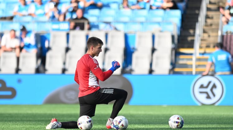 May 14, 2022; Charlotte, North Carolina, USA; Charlotte FC goalkeeper George Marks (31) warms up before a match against CF Montreal at Bank of America Stadium. Mandatory Credit: Griffin Zetterberg-USA TODAY Sports