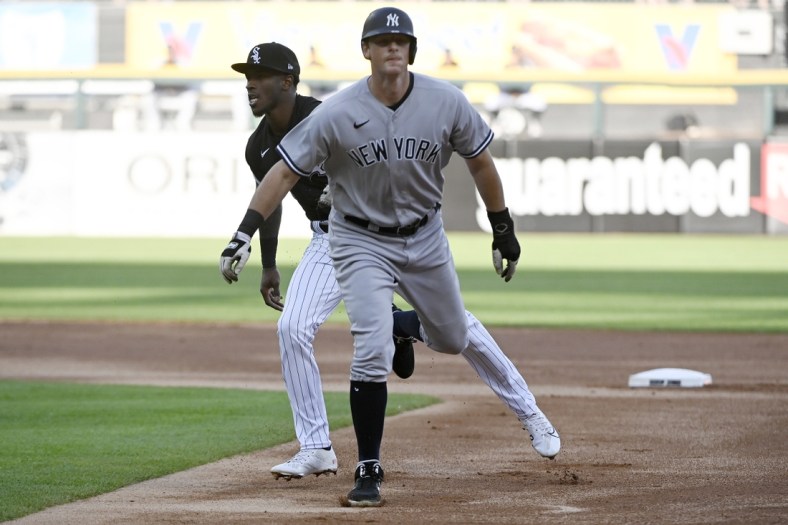 May 14, 2022; Chicago, Illinois, USA;  Chicago White Sox shortstop Tim Anderson (left) tags out New York Yankees second baseman DJ LeMahieu (right) during the first inning at Guaranteed Rate Field. Mandatory Credit: Matt Marton-USA TODAY Sports
