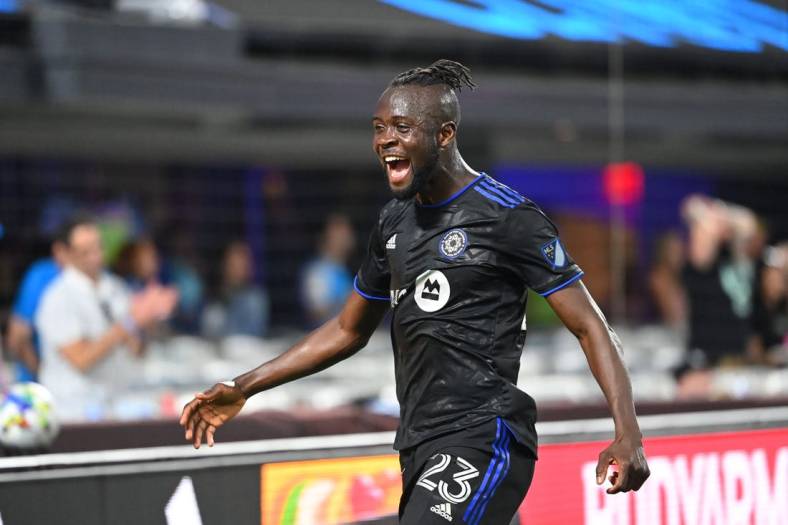 May 14, 2022; Charlotte, North Carolina, USA; CF Montreal forward Kei Kamara (23) reacts after defender Alistair Johnston (22) (not pictured) scores a goal in the second half at Bank of America Stadium. Mandatory Credit: Bob Donnan-USA TODAY Sports