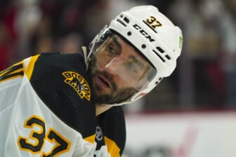 May 14, 2022; Raleigh, North Carolina, USA; Boston Bruins center Patrice Bergeron (37) looks on during the third period against the Carolina Hurricanes in game seven of the first round of the 2022 Stanley Cup Playoffs at PNC Arena. Mandatory Credit: James Guillory-USA TODAY Sports