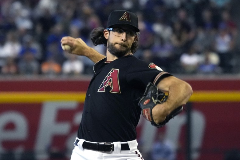 May 14, 2022; Phoenix, Arizona, USA; Arizona Diamondbacks starting pitcher Zac Gallen (23) throws against the Chicago Cubs in the first inning at Chase Field. Mandatory Credit: Rick Scuteri-USA TODAY Sports