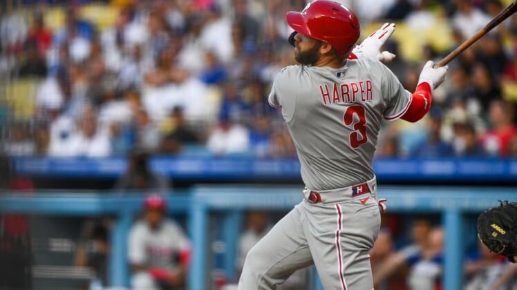 May 14, 2022; Los Angeles, California, USA; Philadelphia Phillies right fielder Bryce Harper (3) hits a double against the Los Angeles Dodgers during the first inning at Dodger Stadium. Mandatory Credit: Jonathan Hui-USA TODAY Sports