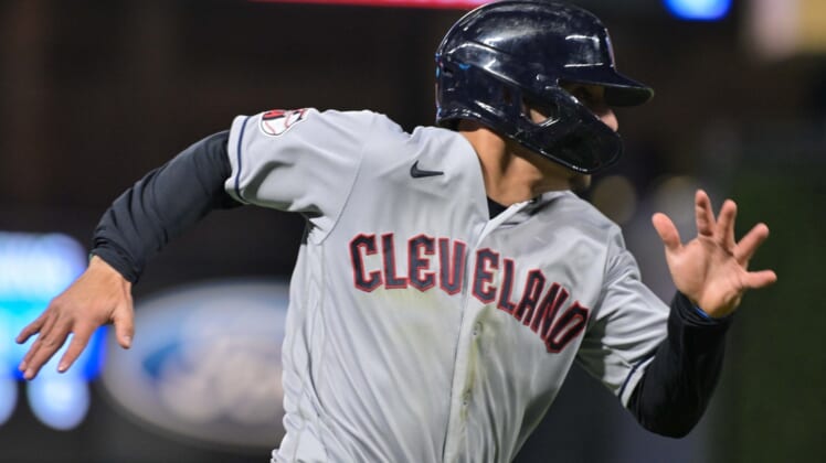 May 14, 2022; Minneapolis, Minnesota, USA;  Cleveland Guardians second baseman Andres Gimenez (0) scores the 2nd run of the 10th inning against the Minnesota Twins at Target Field. Mandatory Credit: Jeffrey Becker-USA TODAY Sports