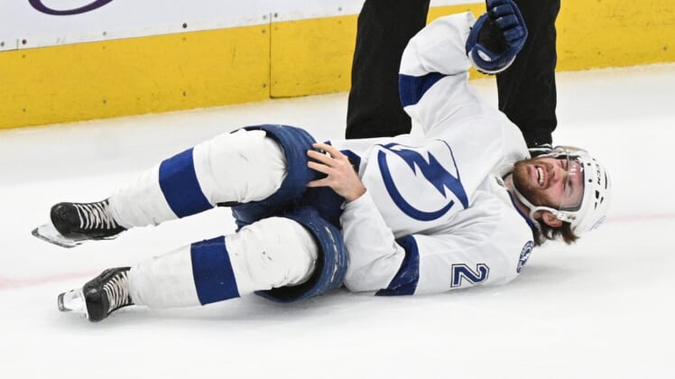 May 14, 2022; Toronto, Ontario, CAN; Tampa Bay Lightning forward Brayden Point (21) reacts after suffering an apparent injuryagainst the Toronto Maple Leafs in game seven of the first round of the 2022 Stanley Cup Playoffs at Scotiabank Arena. Mandatory Credit: Dan Hamilton-USA TODAY Sports