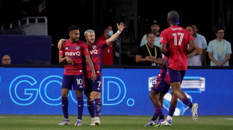 May 14, 2022; Carson, California, USA;  FC Dallas forward Jesus Ferreira (10) celebrates with forward Paul Arriola (7) after scoring against the LA Galaxy during the first half at Dignity Health Sports Park. Mandatory Credit: Kiyoshi Mio-USA TODAY Sports