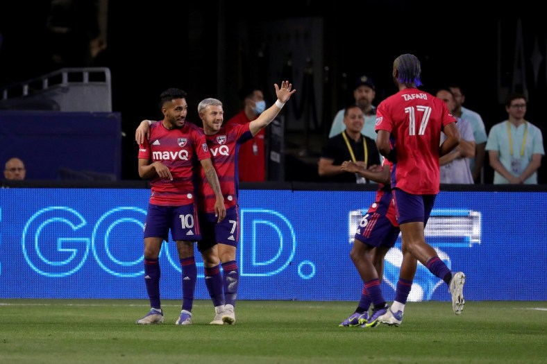 May 14, 2022; Carson, California, USA;  FC Dallas forward Jesus Ferreira (10) celebrates with forward Paul Arriola (7) after scoring against the LA Galaxy during the first half at Dignity Health Sports Park. Mandatory Credit: Kiyoshi Mio-USA TODAY Sports
