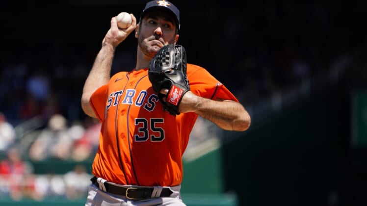 May 15, 2022; New York City, New York, USA; Houston Astros pitcher Justin Verlander (35) delivers a pitch against the Washington Nationals during the ninth inning at Citi Field. Mandatory Credit: Gregory Fisher-USA TODAY Sports