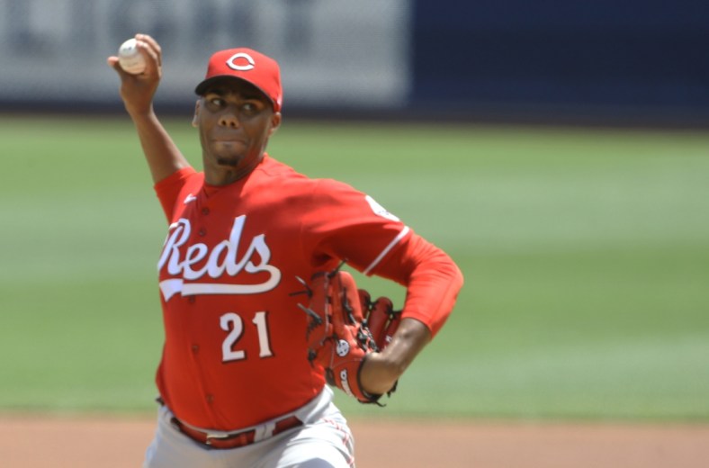 May 15, 2022; Pittsburgh, Pennsylvania, USA;  Cincinnati Reds starting pitcher Hunter Greene (21) delivers a pitch against the Pittsburgh Pirates during the first inning at PNC Park. Mandatory Credit: Charles LeClaire-USA TODAY Sports