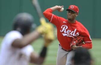 May 15, 2022; Pittsburgh, Pennsylvania, USA;  Cincinnati Reds starting pitcher Hunter Greene (21) pitches to Pittsburgh Pirates third baseman Ke'Bryan Hayes (13) during the first inning at PNC Park. Mandatory Credit: Charles LeClaire-USA TODAY Sports
