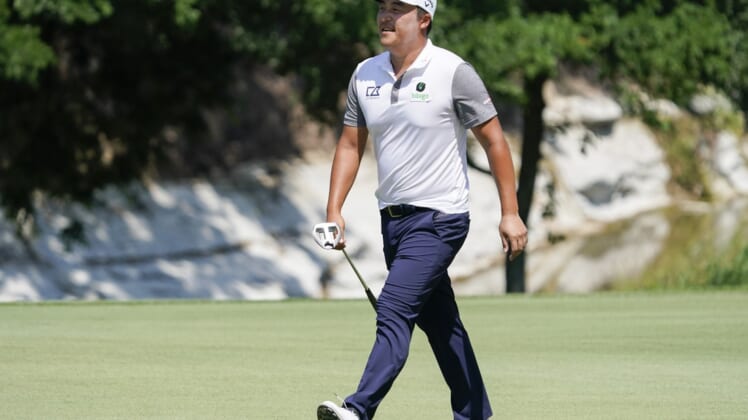 May 15, 2022; McKinney, Texas, USA; K.H. Lee  walks to the first green during the final round of the AT&T Byron Nelson golf tournament. Mandatory Credit: Raymond Carlin III-USA TODAY Sports