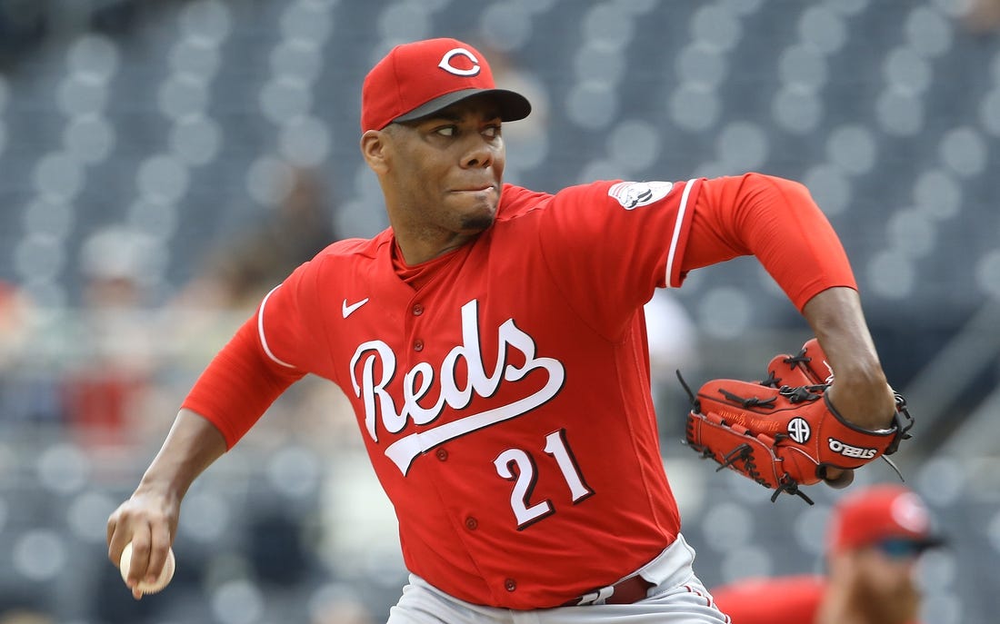 May 15, 2022; Pittsburgh, Pennsylvania, USA;  Cincinnati Reds starting pitcher Hunter Greene (21) pitches against the Pittsburgh Pirates during the sixth inning at PNC Park. Mandatory Credit: Charles LeClaire-USA TODAY Sports