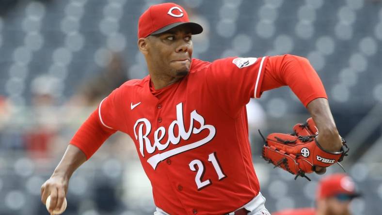 May 15, 2022; Pittsburgh, Pennsylvania, USA;  Cincinnati Reds starting pitcher Hunter Greene (21) pitches against the Pittsburgh Pirates during the sixth inning at PNC Park. Mandatory Credit: Charles LeClaire-USA TODAY Sports