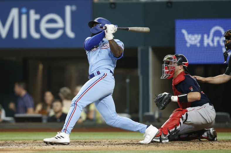 May 15, 2022; Arlington, Texas, USA; Texas Rangers center fielder Adolis Garcia (53) hits a home run against the Boston Red Sox in the sixth inning at Globe Life Field. Mandatory Credit: Tim Heitman-USA TODAY Sports