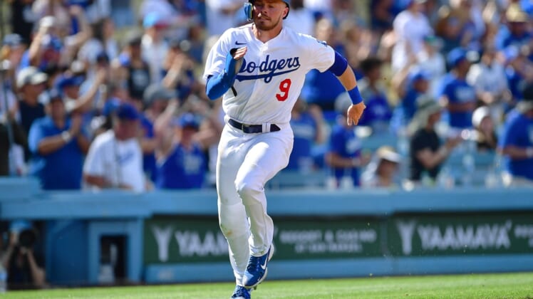 May 15, 2022; Los Angeles, California, USA; Los Angeles Dodgers second baseman Gavin Lux (9) scores a run against the Philadelphia Phillies during the eighth inning at Dodger Stadium. Mandatory Credit: Gary A. Vasquez-USA TODAY Sports