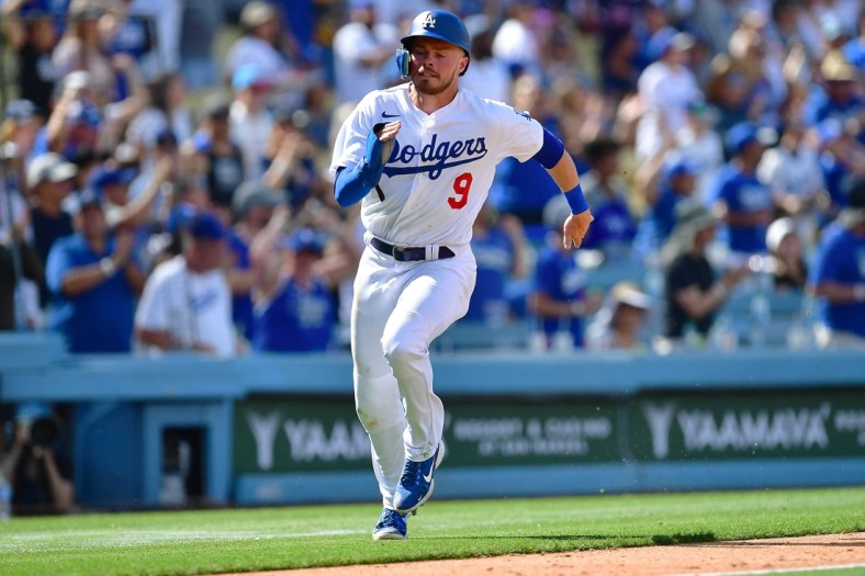May 15, 2022; Los Angeles, California, USA; Los Angeles Dodgers second baseman Gavin Lux (9) scores a run against the Philadelphia Phillies during the eighth inning at Dodger Stadium. Mandatory Credit: Gary A. Vasquez-USA TODAY Sports