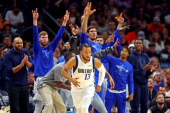 May 15, 2022; Phoenix, Arizona, USA; Dallas Mavericks guard Jalen Brunson (13) and the Dallas Mavericks bench react after a play during the third quarter against the Phoenix Suns in game seven of the second round for the 2022 NBA playoffs at Footprint Center. Mandatory Credit: Mark J. Rebilas-USA TODAY Sports