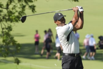 May 16, 2022; Tulsa, Oklahoma, USA; Tiger Woods hits his tee shot on the 13th hole during a practice round for the PGA Championship golf tournament at Southern Hills Country Club. Mandatory Credit: Michael Madrid-USA TODAY Sports