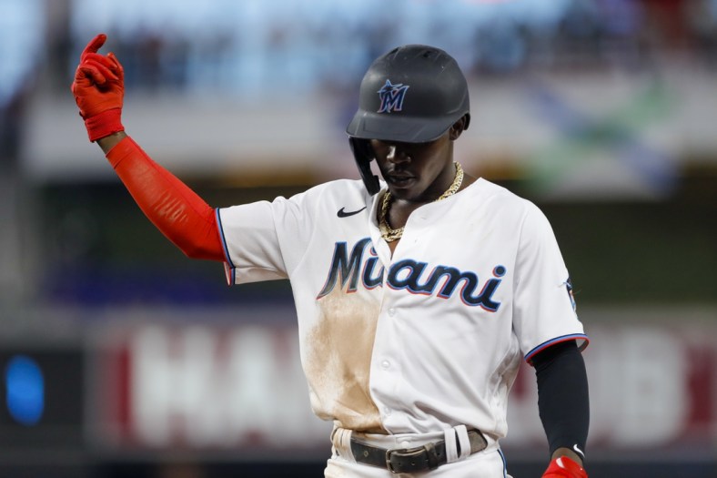 May 16, 2022; Miami, Florida, USA; Miami Marlins second baseman Jazz Chisholm Jr. (2) reacts from first base after hitting an RBI single during the second inning against the Washington Nationals at loanDepot Park. Mandatory Credit: Sam Navarro-USA TODAY Sports