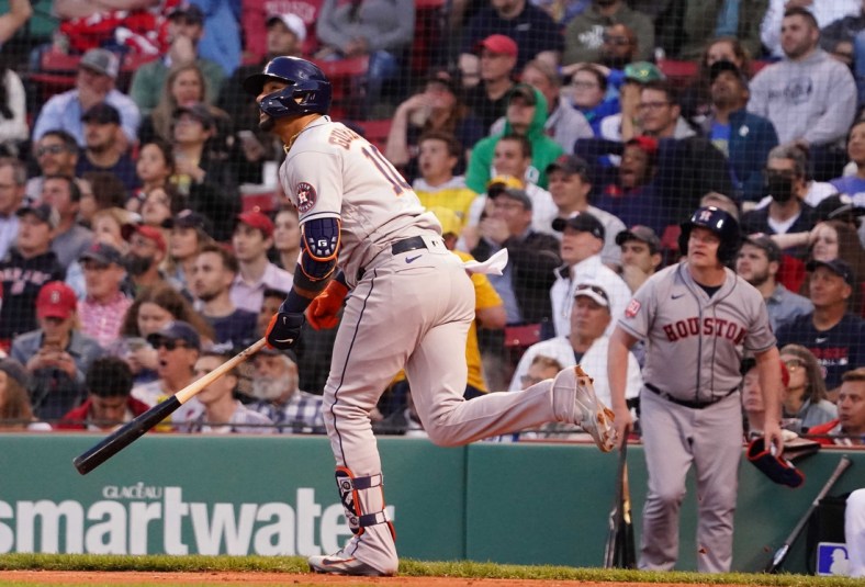 May 17, 2022; Boston, Massachusetts, USA; Houston Astros first baseman Yuli Gurriel (10) hits a two run home run against the Boston Red Sox in the second inning at Fenway Park. Mandatory Credit: David Butler II-USA TODAY Sports