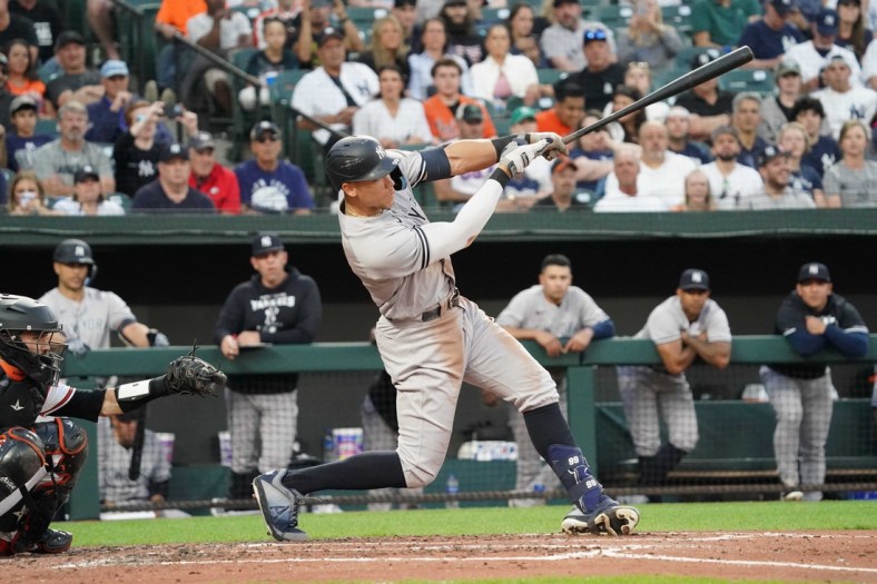 May 17, 2022; Baltimore, Maryland, USA; New York Yankees outfielder Aaron Judge (99) connects on his third inning solo home run against the Baltimore Orioles at Oriole Park at Camden Yards. Mandatory Credit: Mitch Stringer-USA TODAY Sports