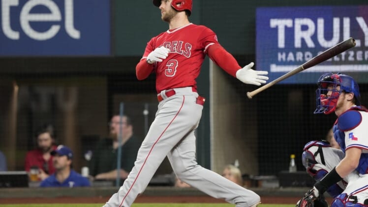 May 17, 2022; Arlington, Texas, USA; Los Angeles Angels right fielder Taylor Ward (3) follows through on his home run against the Texas Rangers during the third inning of a baseball game at Globe Life Field. Mandatory Credit: Jim Cowsert-USA TODAY Sports